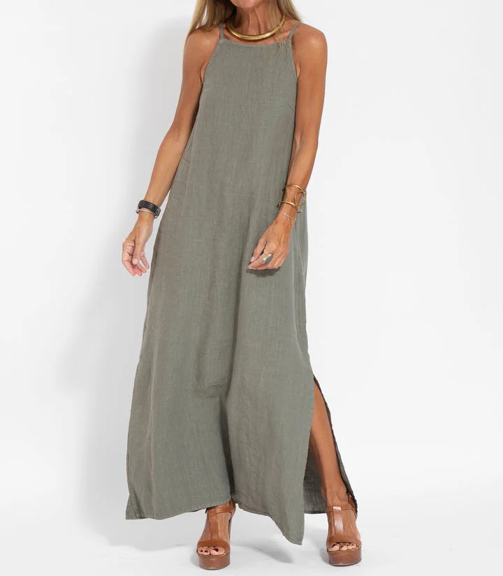 Women's sleeveless halter neck maxi dress in lightweight fabric with side slits for free movement