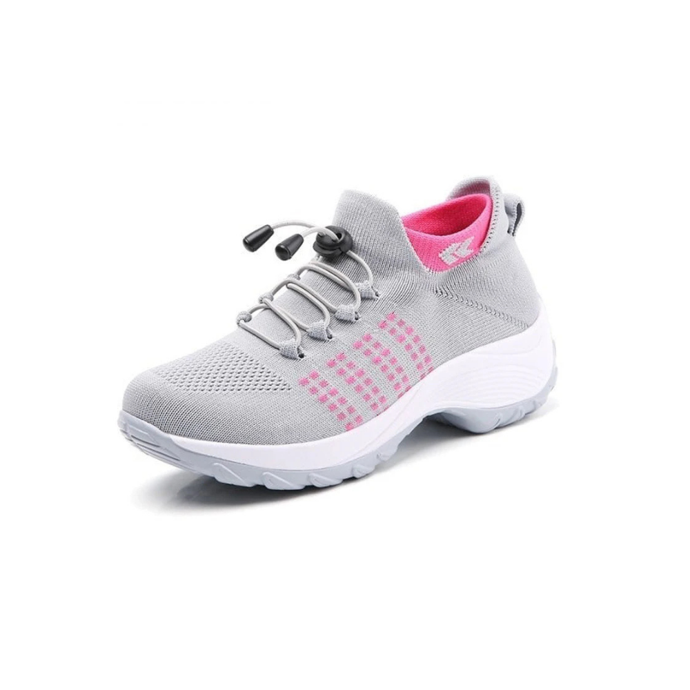 Women's white orthopedic sneakers with breathable upper, arch support, and shock-absorbing sole for daily wear