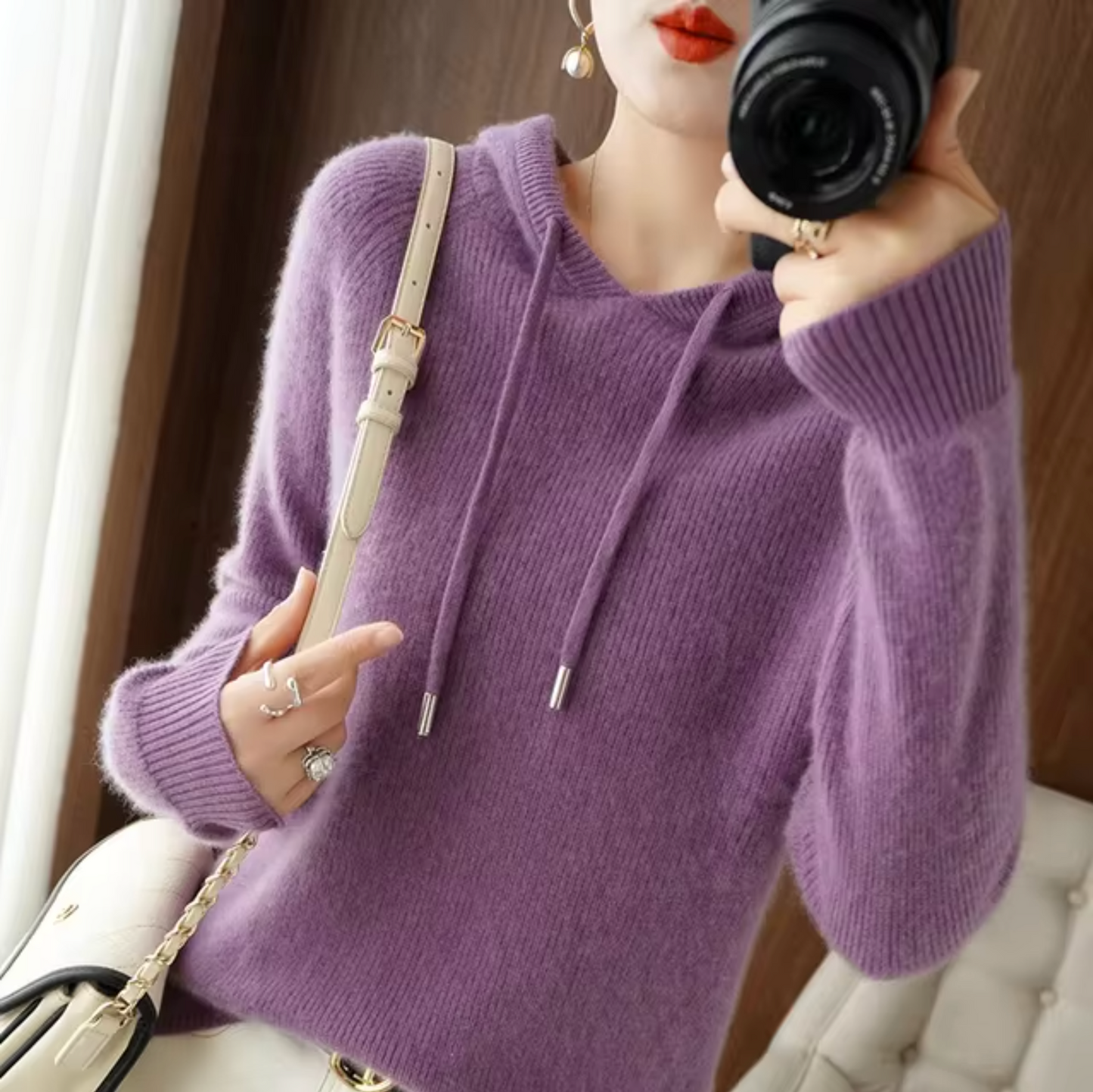 Women's cozy knit hoodie with adjustable hood, long sleeves, minimalist style for everyday layering