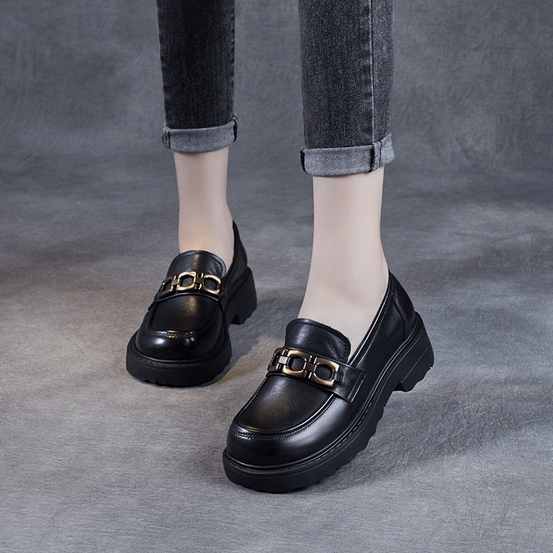 Black women's loafers with gold chain detail, sleek silhouette for office and everyday wear