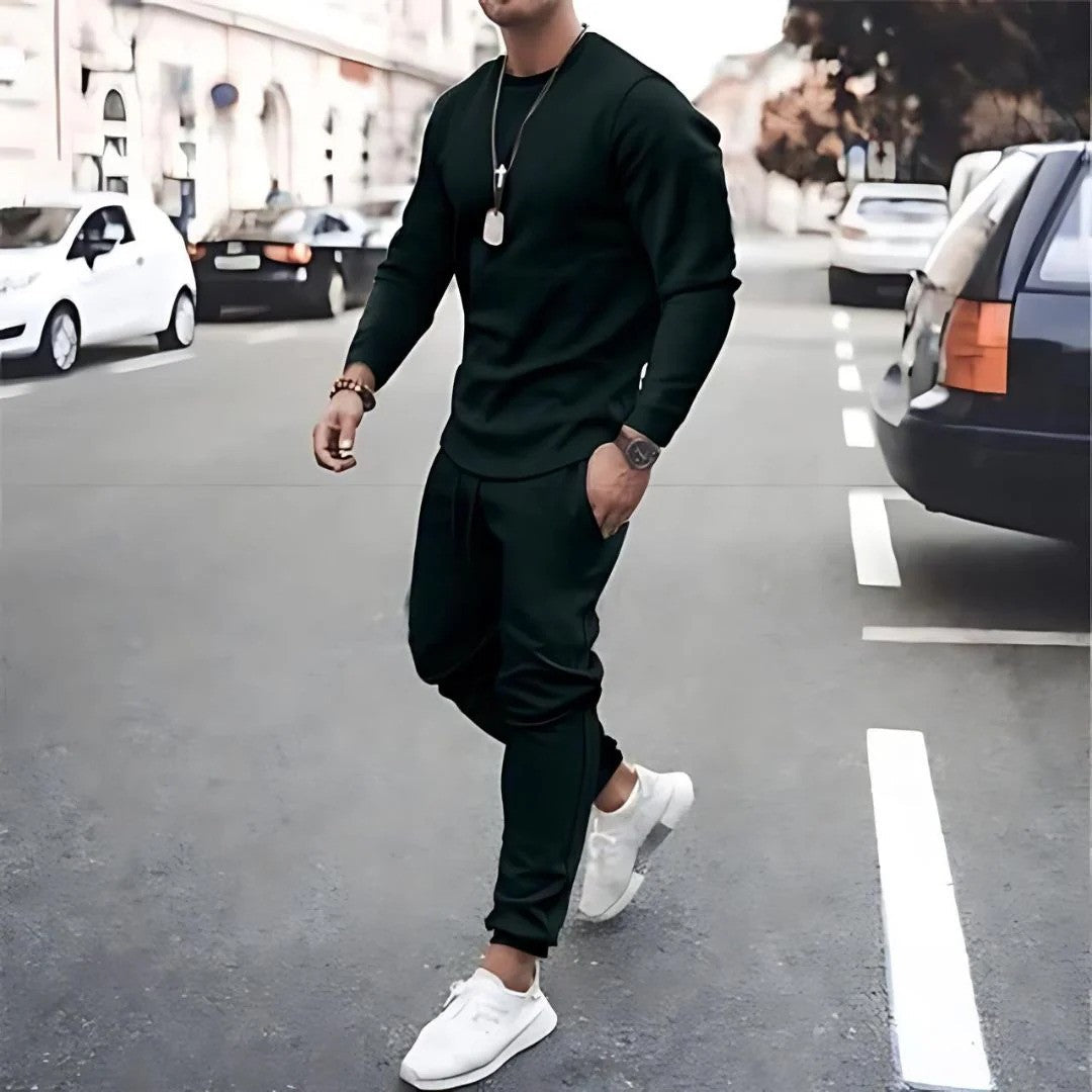 Men's gray casual two-piece tracksuit with long-sleeve top and jogger set, minimalist coordinated style
