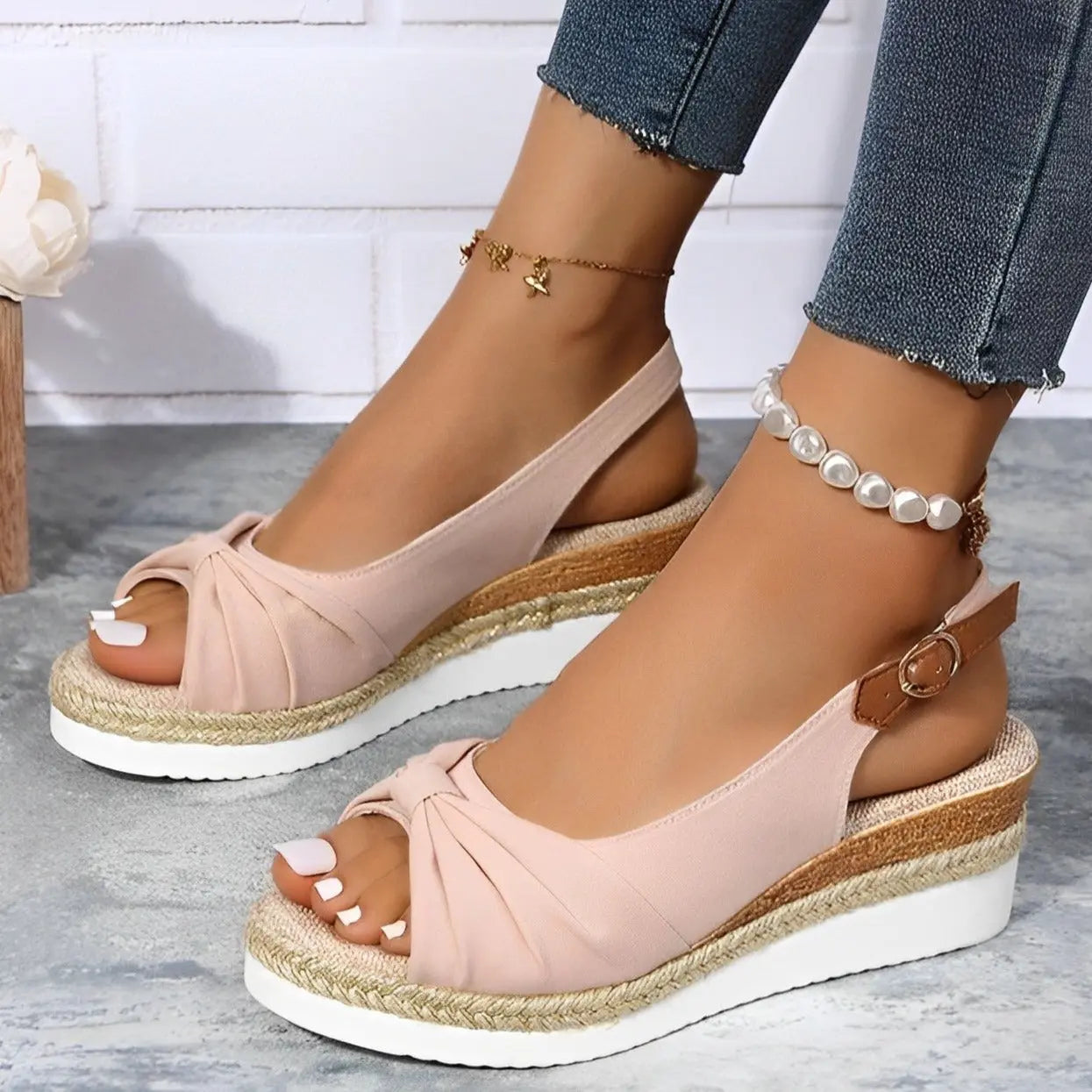 Women's espadrille wedge sandals with chic knot detail, cushioned sole, and secure slingback strap