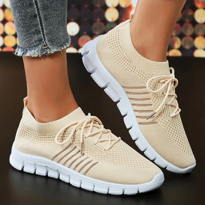 Women's lightweight white athletic sneakers breathable mesh upper cushioned sole everyday comfort