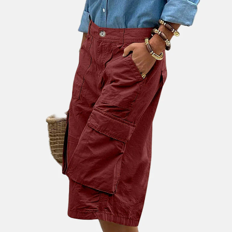 Women's relaxed cargo pants in neutral tones, breathable soft fabric with multiple utility pockets
