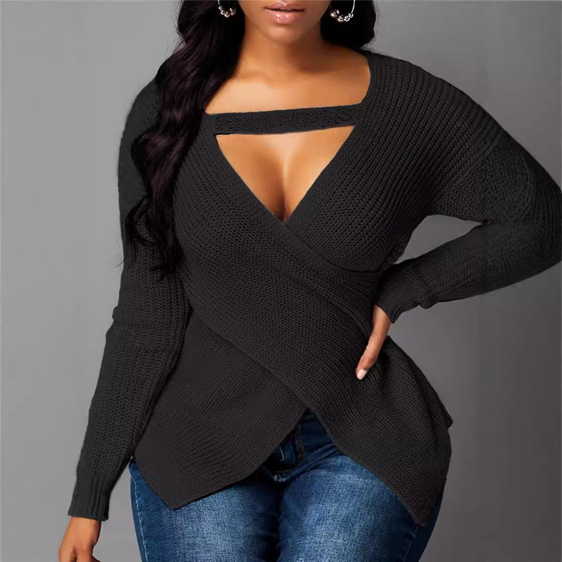 Women's fitted knit pullover sweater with asymmetric V-neck and cross design detail