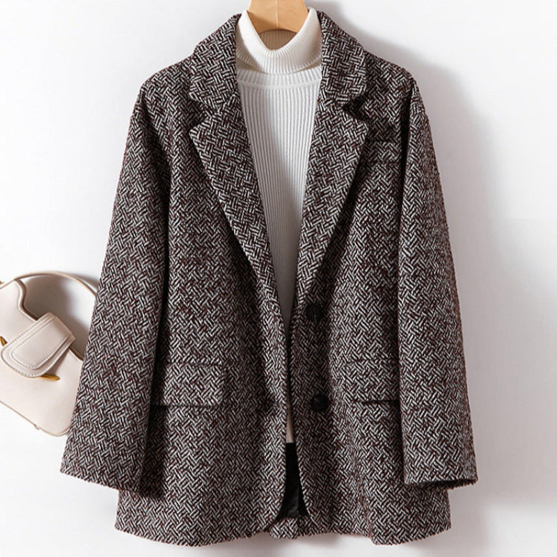 Women's relaxed fit geometric wool blazer, structured contemporary silhouette for effortless professional style