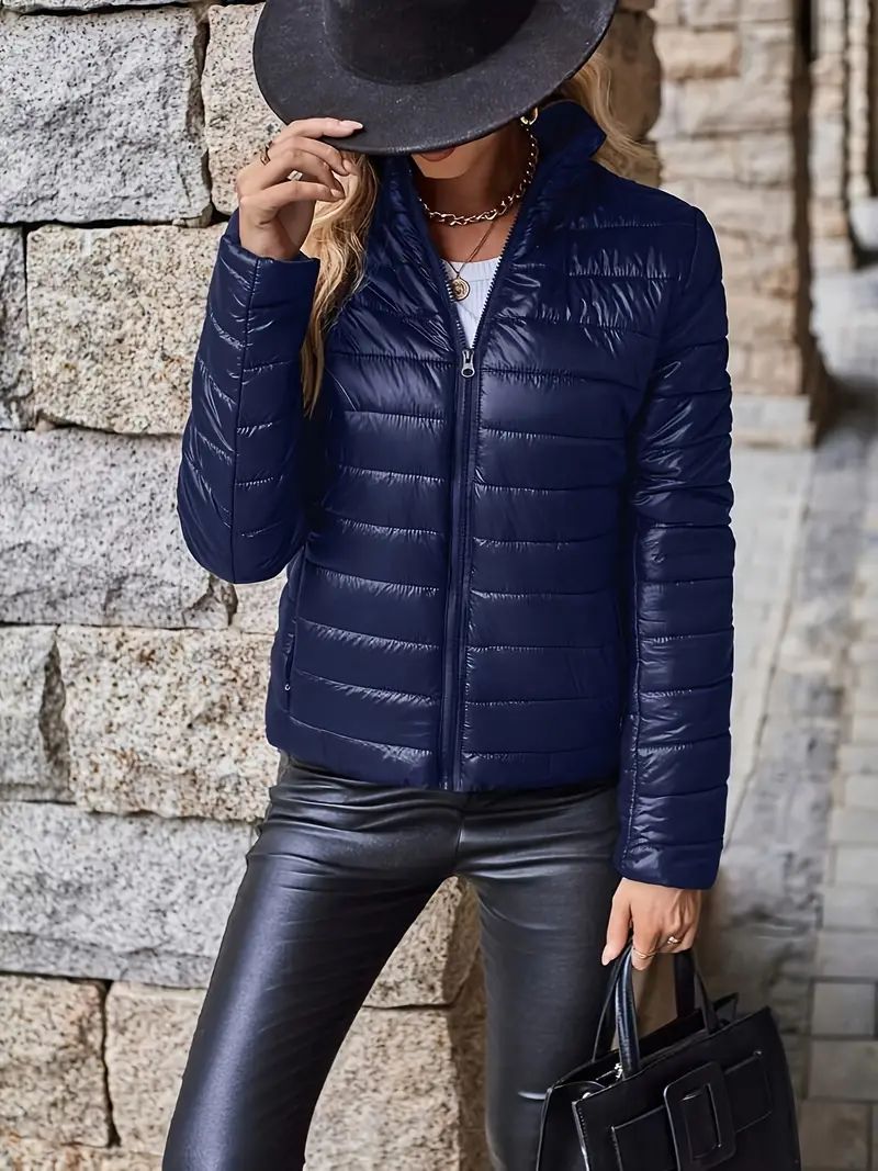 Women's black quilted jacket tailored fit stand collar zipper closure padded lightweight warmth
