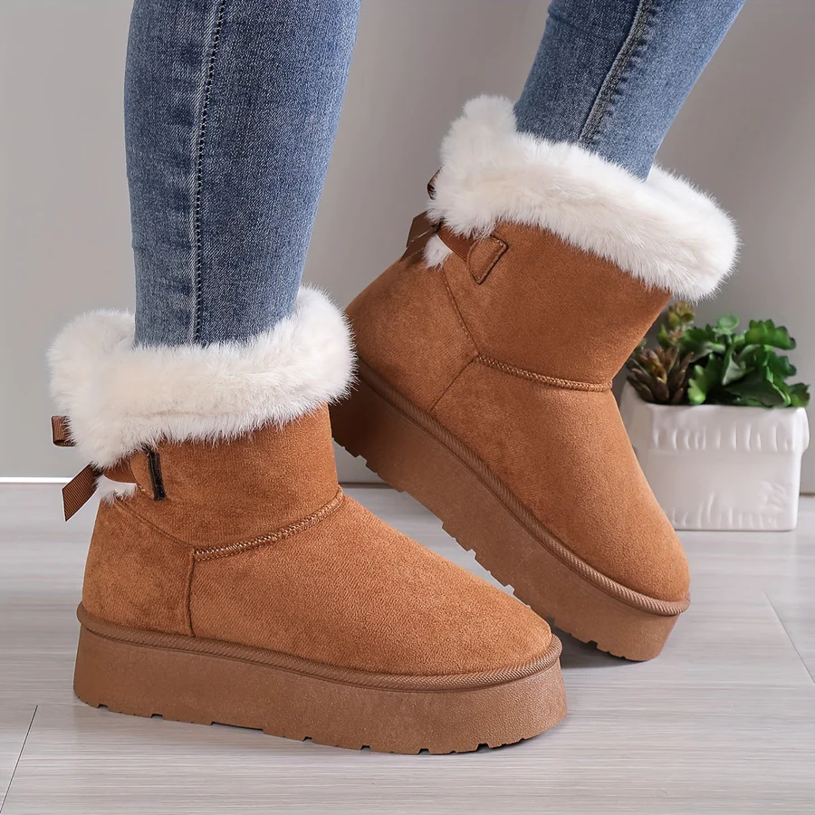 Women's slip-on winter boots in faux suede with plush faux fur lining for cozy warmth
