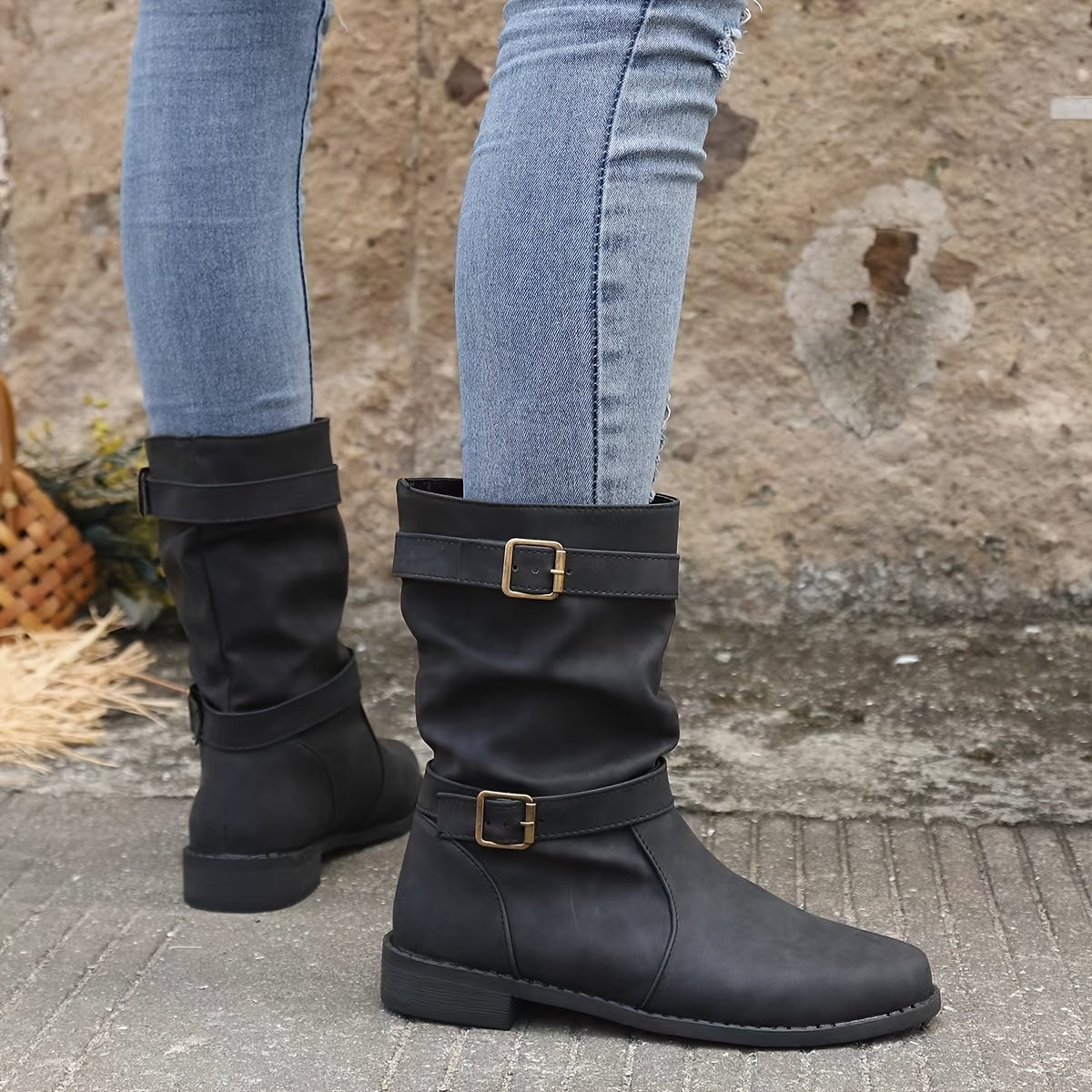 Women's slouchy black ankle boots with buckle strap detail, Western-inspired casual style