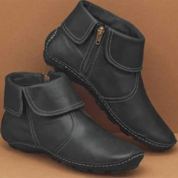 Women's black faux leather ankle boots cushioned insole flexible rubber outsole all-day comfort