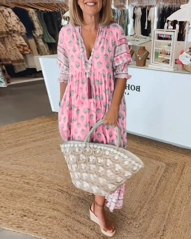 Women's bold print V-neck half sleeve dress with flattering silhouette for everyday chic style