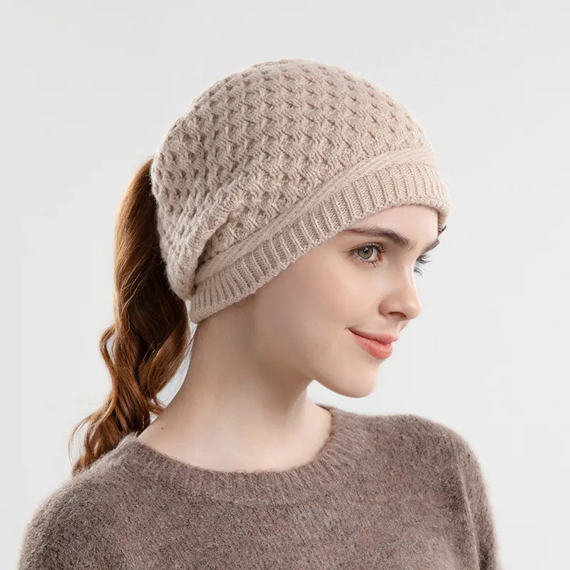 Women's slouchy textured knit wool beanie with ponytail opening, cozy soft casual winter hat