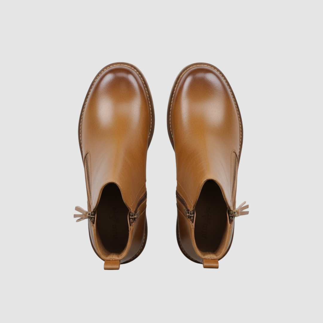 Women's brown leather mid-heel boots with side zipper, winter-ready style for all-day comfort