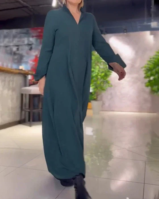 Women's loose maxi dress with side slit, V-neck collar, casual winter style in flowing silhouette