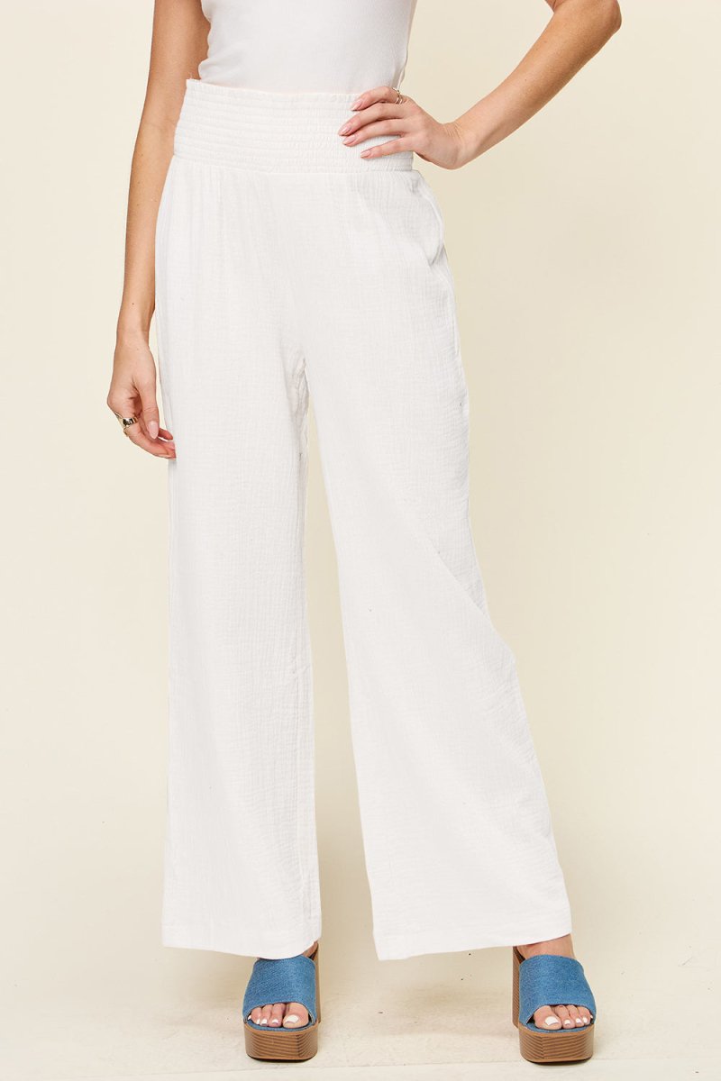 Plus size wide leg pants with smocked elastic waist, textured cotton fabric in versatile everyday style