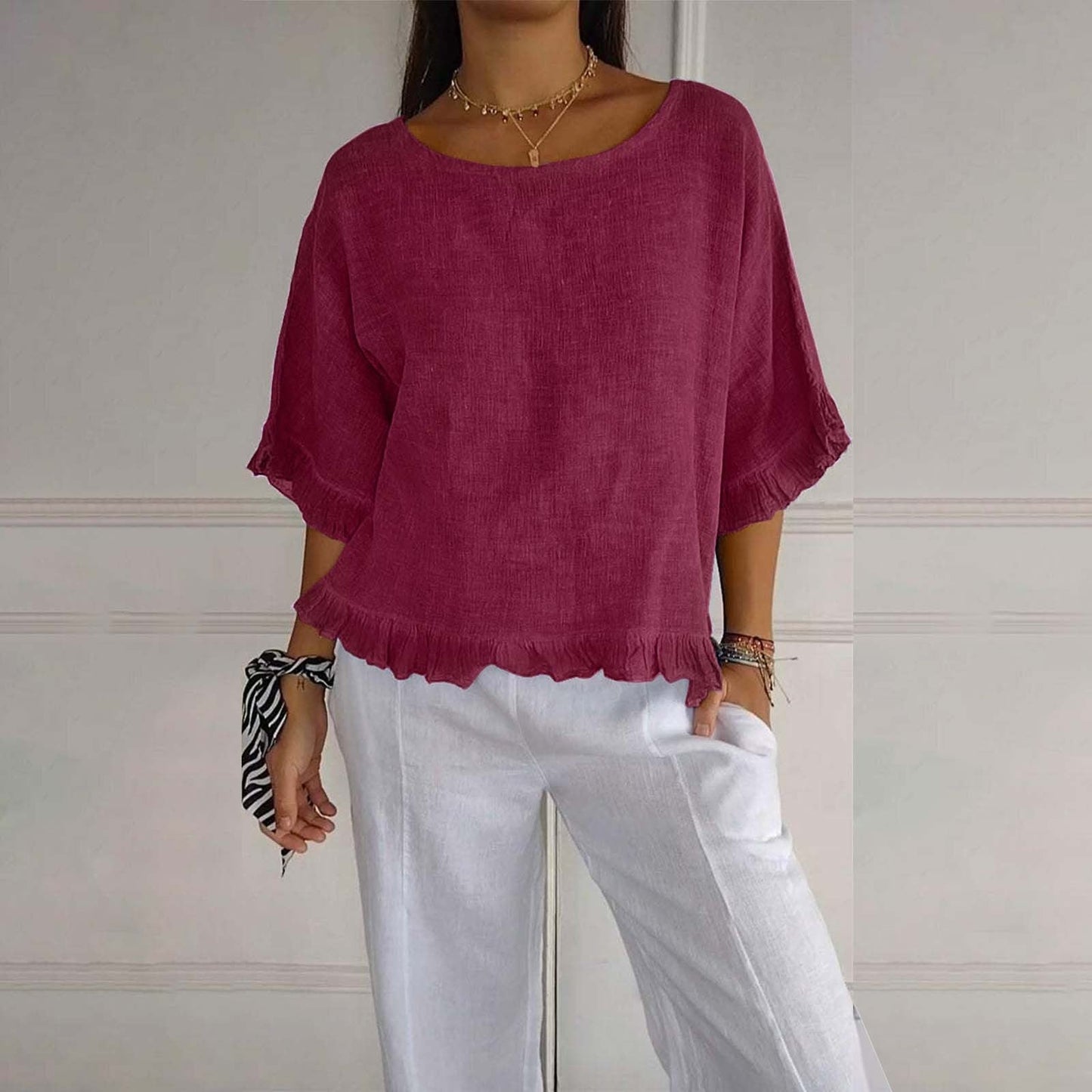 Women's loose fit ruffle blouse, airy silhouette with delicate frills at cuffs and hem for easy layering