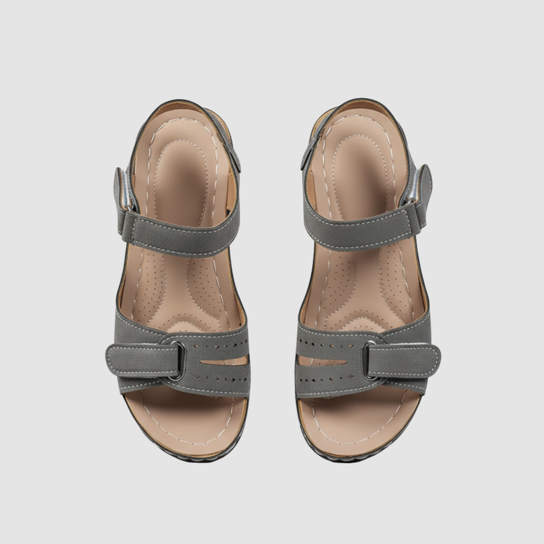 Women's wedge strap sandals in neutral tones with adjustable closure for all-day summer comfort