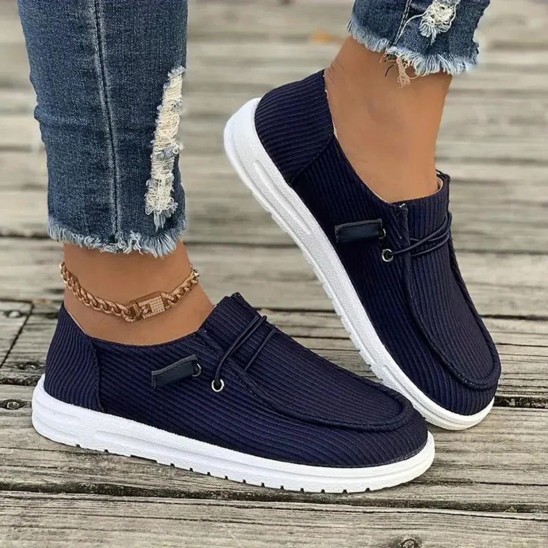 Women's slip-on hiking boots in neutral tones, laceless outdoor style with cushioned comfort support