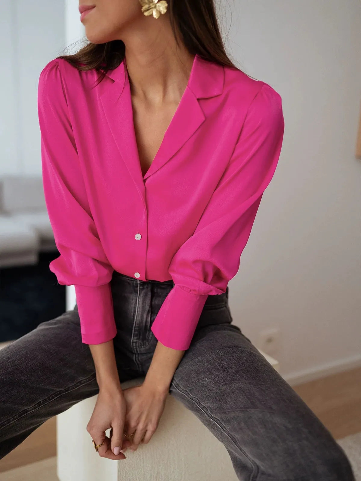 Women's relaxed fit long sleeve blouse with elegant draping and classic button closure