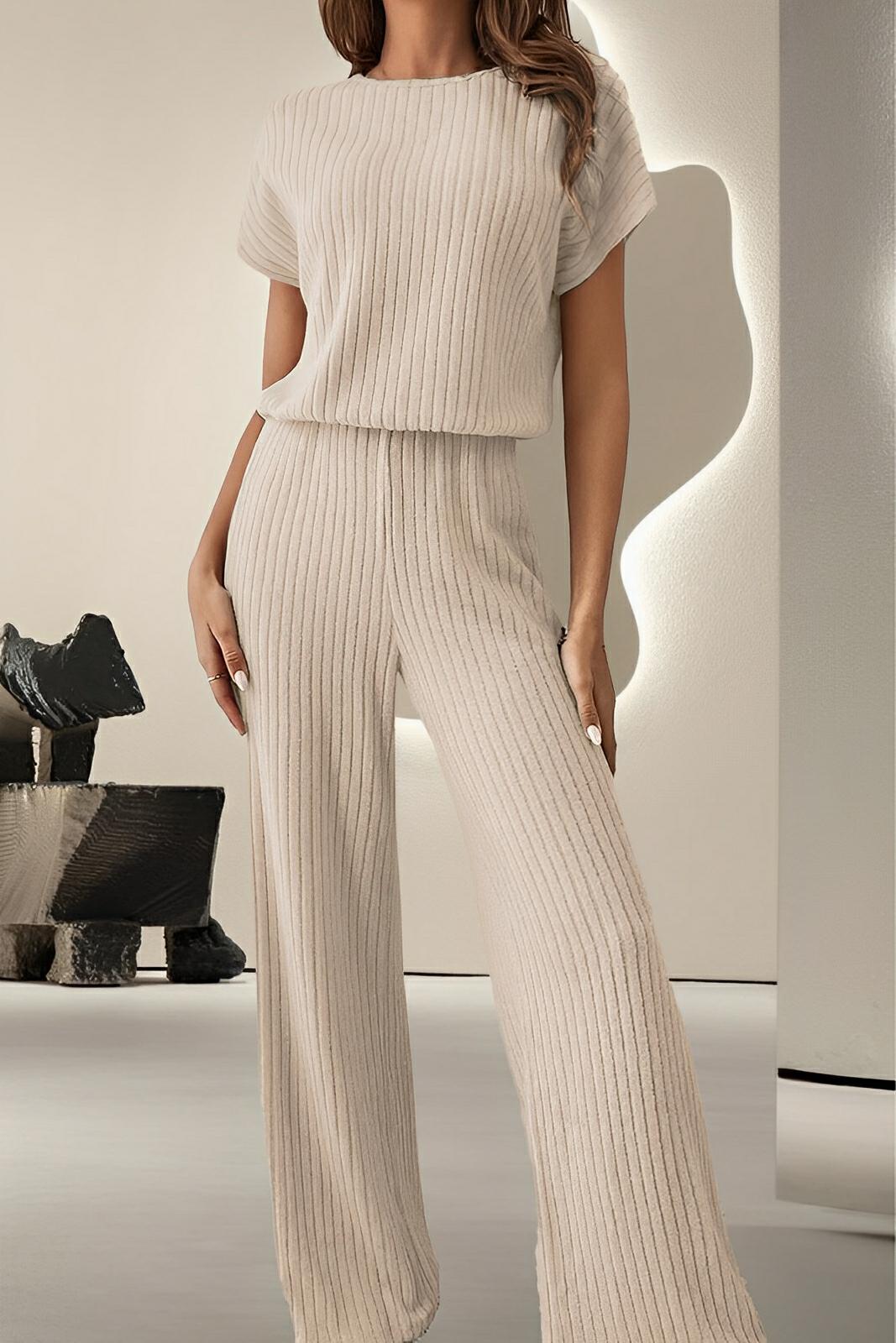 Women's black round neck short sleeve professional jumpsuit with sleek one-piece tailored silhouette