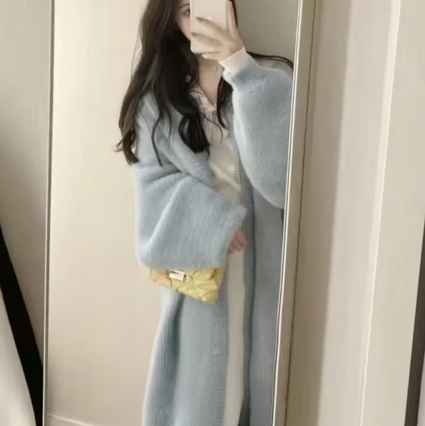 Women's oversized open-front long knit cardigan with draped silhouette for effortless layering