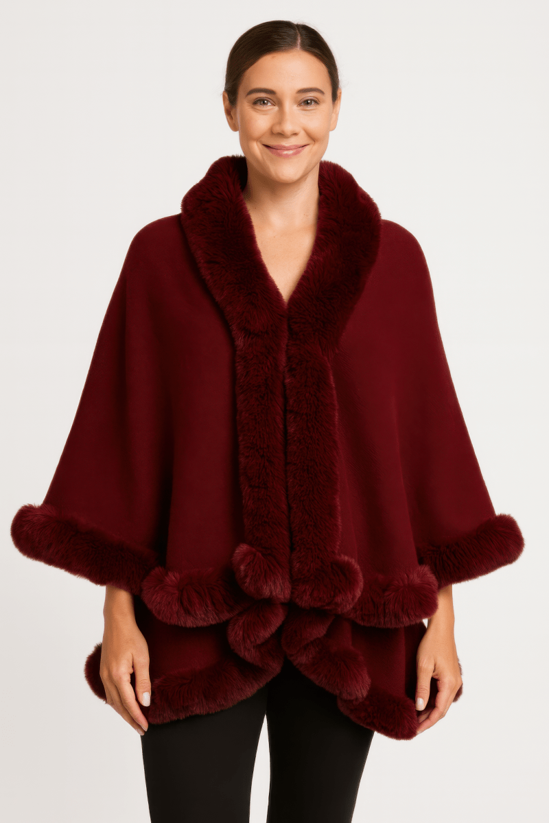 Women black faux fur trim cape coat with hook closure and elegant structured silhouette