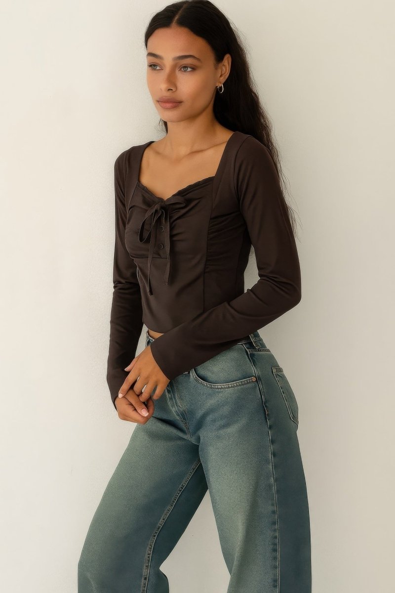 Women's long sleeve scrunch bow top with ruffle detail in flattering slim silhouette