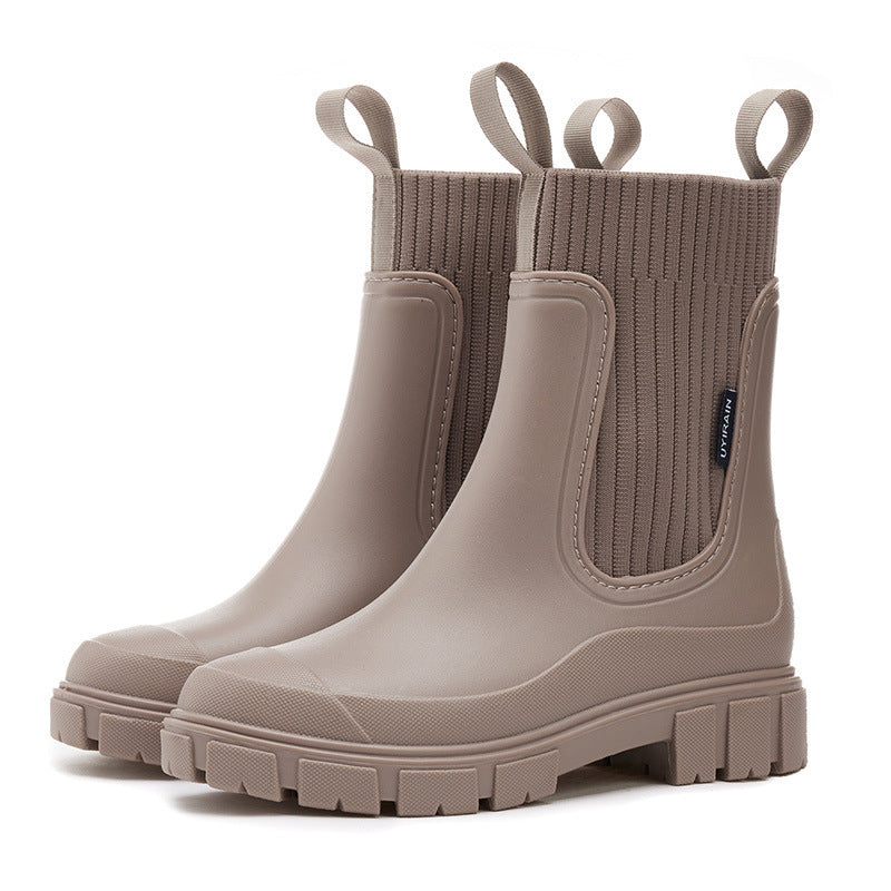 Waterproof rubber Wellington rain boots with non-slip sole, durable all-weather outdoor footwear