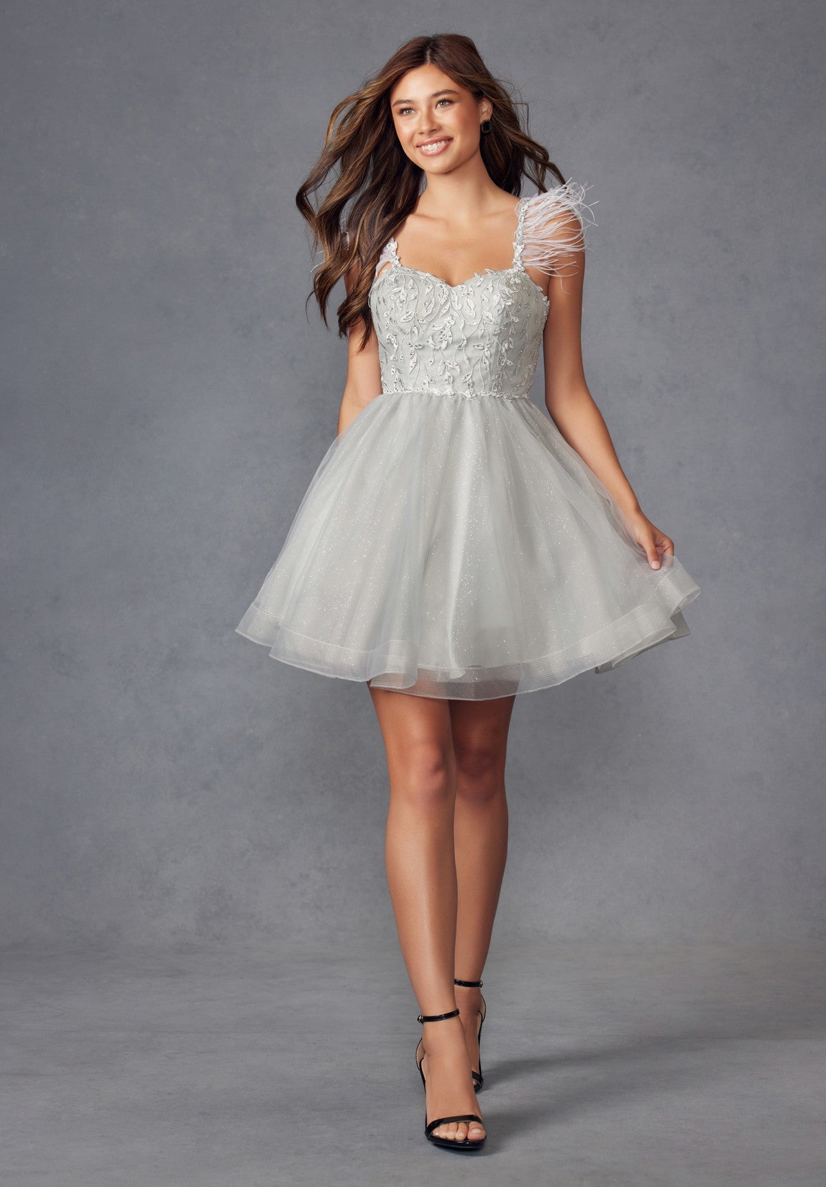Black feathered mini cocktail dress sleeveless sweetheart neckline open back A-line silhouette