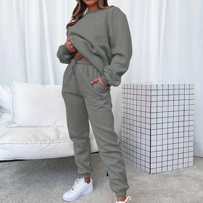 Women's gray matching sweatshirt and jogger lounge set with relaxed minimalist silhouette