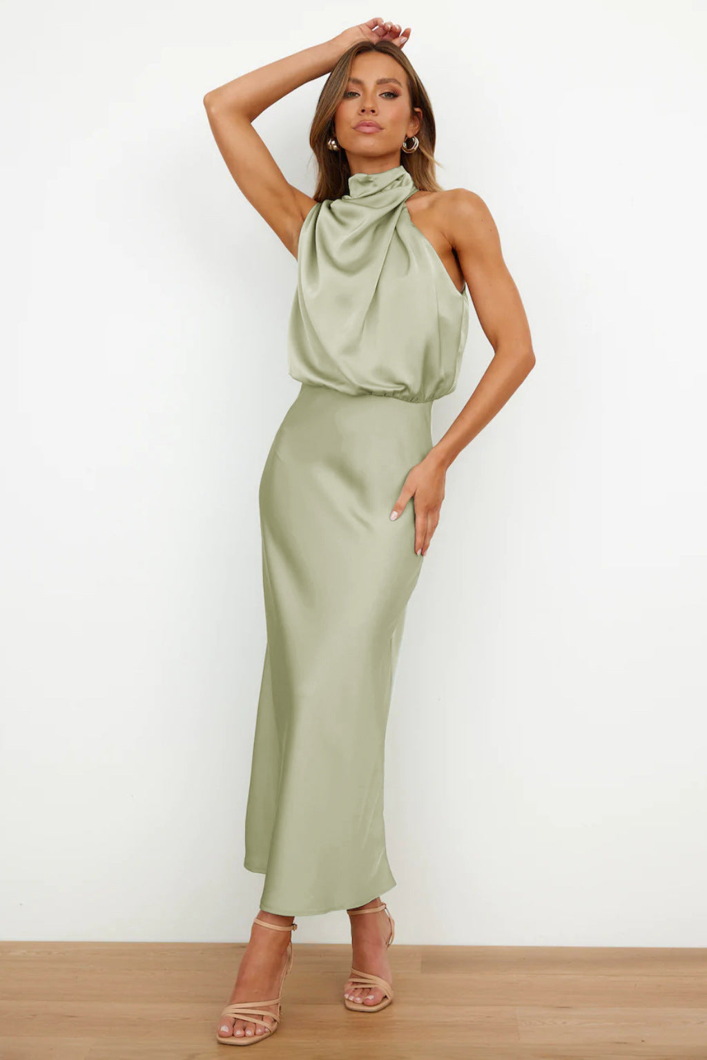 Women's satin evening dress in elegant cut, versatile midi length with smooth drape and polished finish