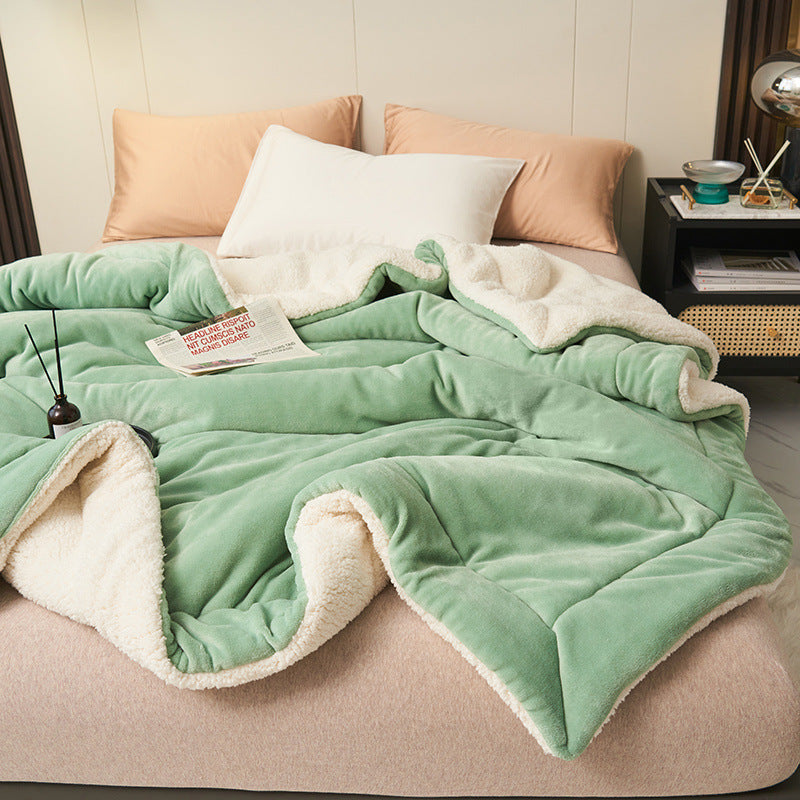 Reversible sherpa flannel throw blanket in neutral tones with dual-texture cozy design for home lounging