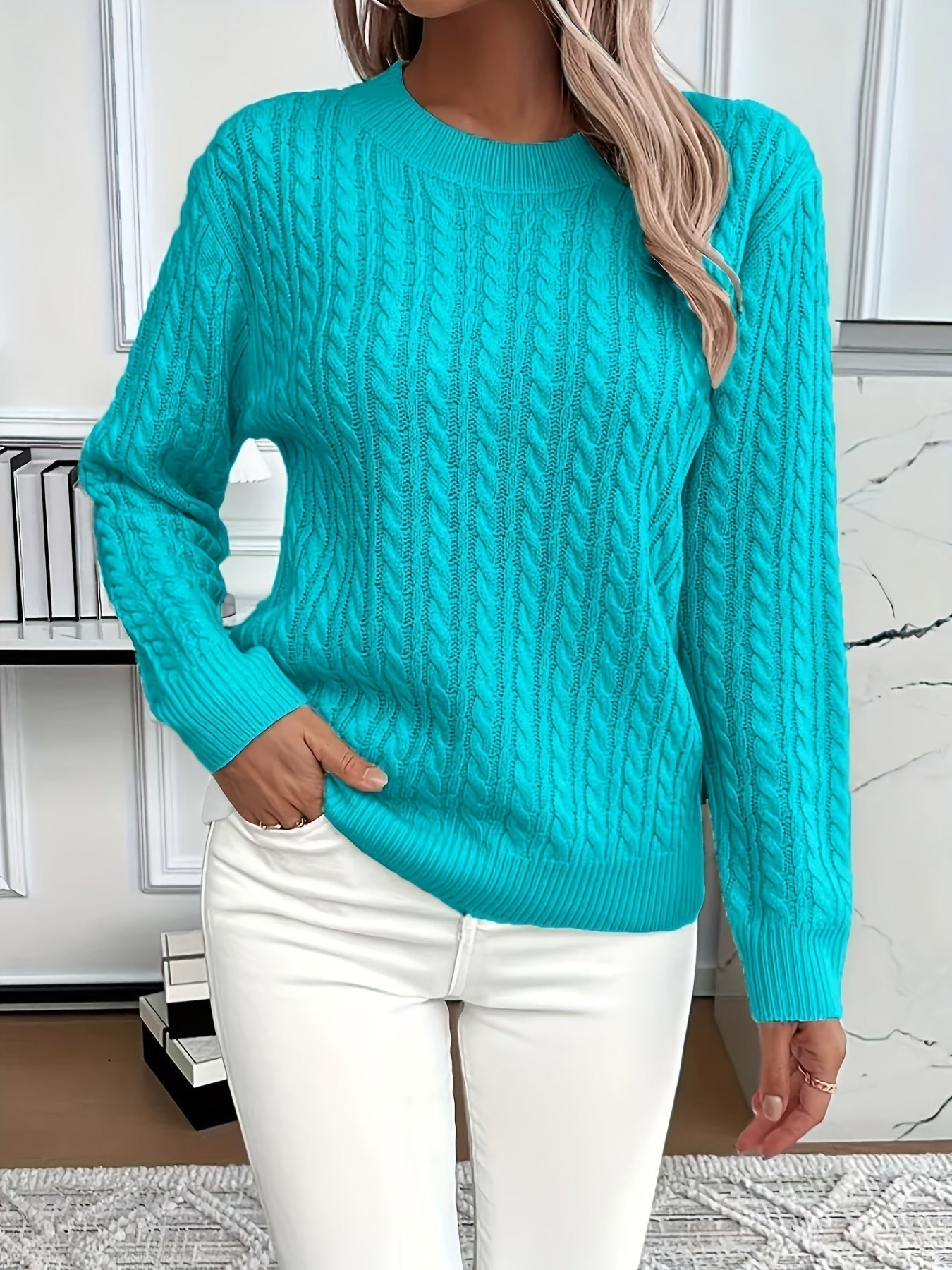 Women's cream cable knit crewneck sweater with relaxed fit and classic textured pattern for everyday layering