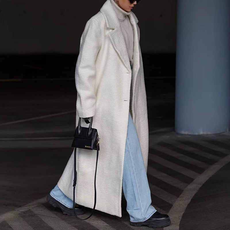 Women's gray beige plush long coat tailored silhouette soft teddy texture chic winter essential