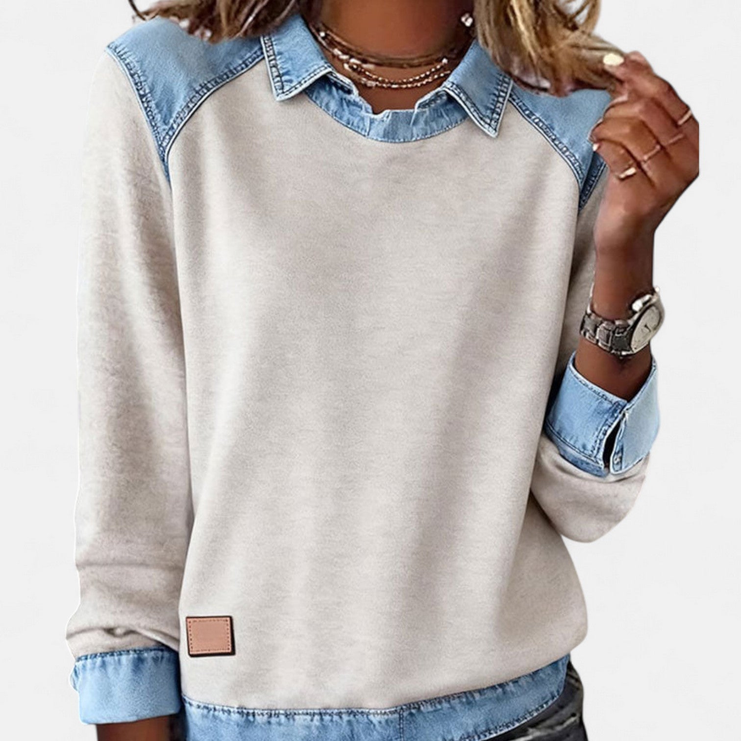 Women's layered sweatshirt with faux denim collar and cuffs, relaxed casual pullover style