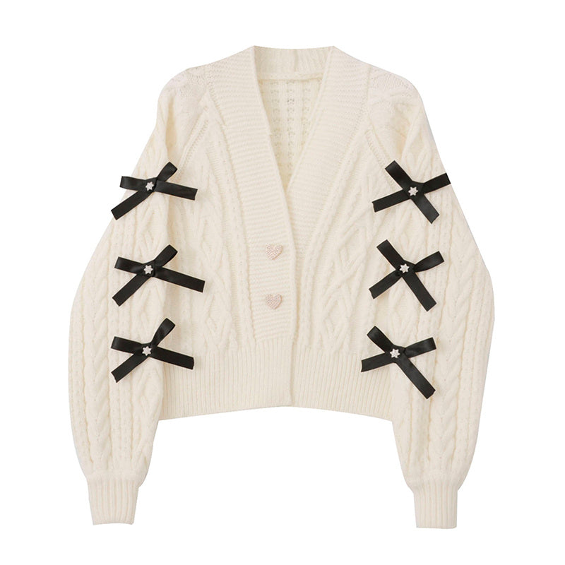 Women's soft knit cardigan with bow sleeve details, elegant cozy style for versatile everyday outfits