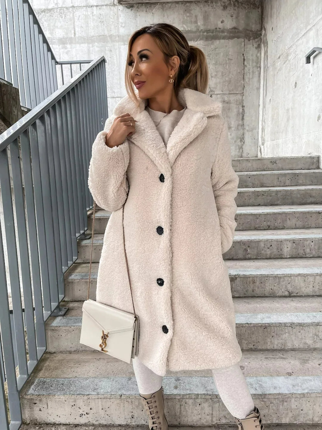 Women's elegant plush trench coat in cozy premium fabric with timeless silhouette and luxe texture