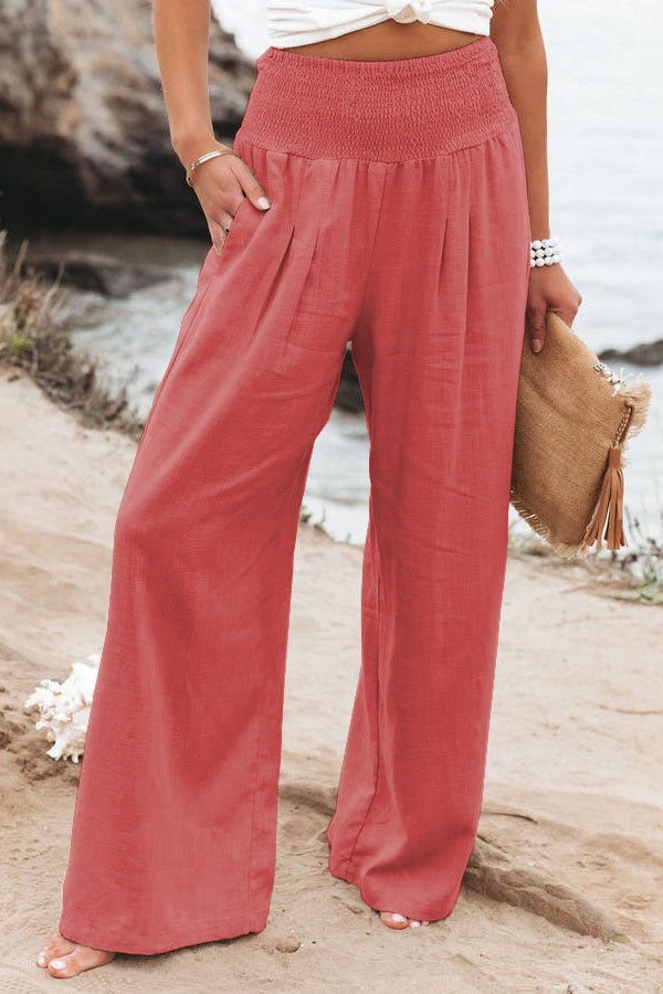 Women's wide leg vacation trousers flowy silhouette beige linen-look fabric beach travel style
