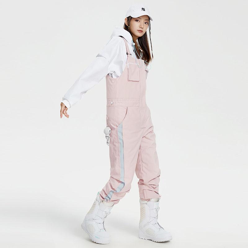 Women's waterproof ski bib pants with adjustable suspenders, snow gaiters, and fully taped seams