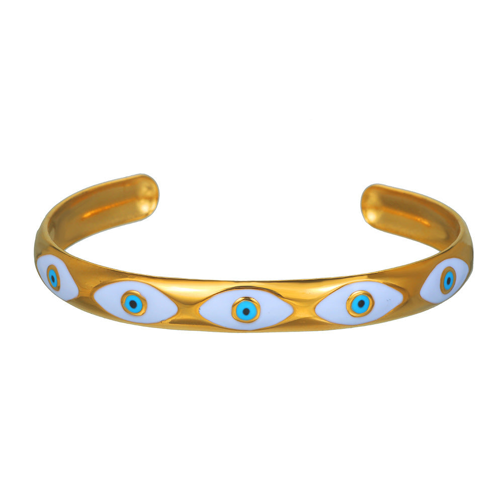 Women's gold-tone Nazar Evil Eye bracelet with colorful accents, elegant protective symbol jewelry