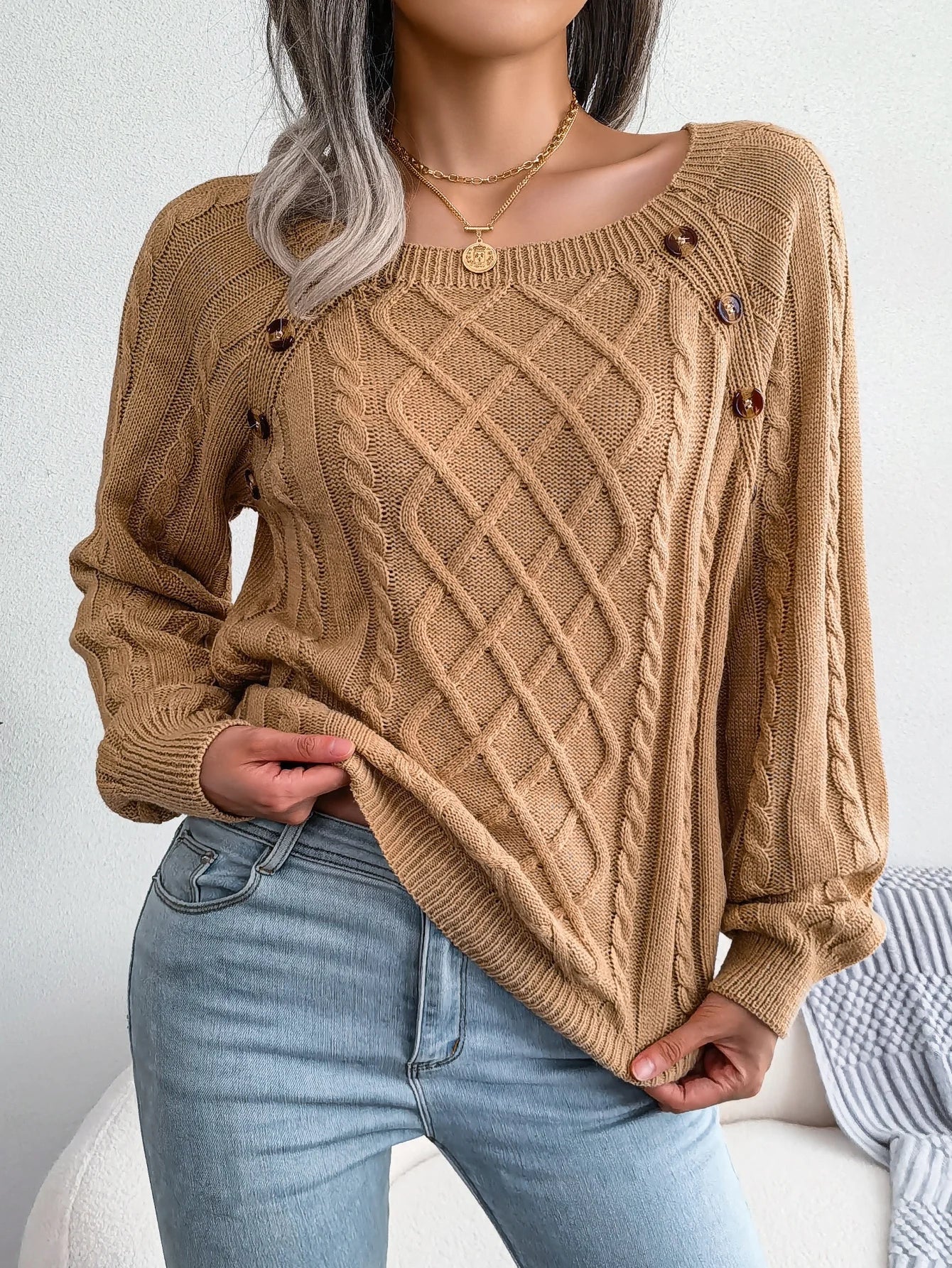 Women's cream diamond cable knit pullover sweater with button details, cozy breathable layering style
