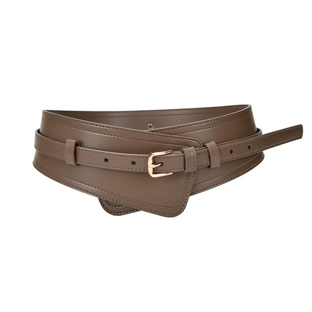 Women's black imitation leather wide harness belt with bold waist-defining contemporary silhouette