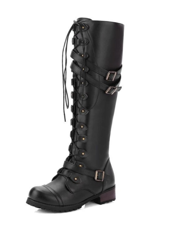 Women's black high-top biker boots with belt buckle rivets, lace-up leather paneling, round toe