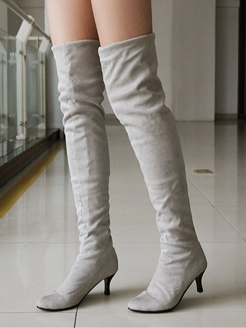 Women's brown suede stiletto high boots pointed toe slip-on style for chic winter elegance