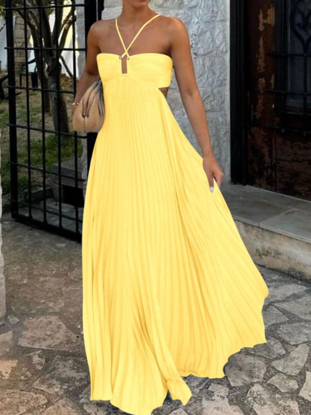 Solid pleated bandeau maxi dress with high waist suspender straps and sleeveless halter silhouette
