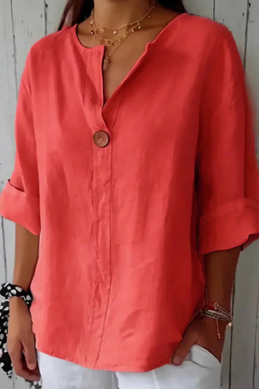 Women's relaxed blouse soft draped silhouette rolled short sleeves V-slit neckline effortless chic