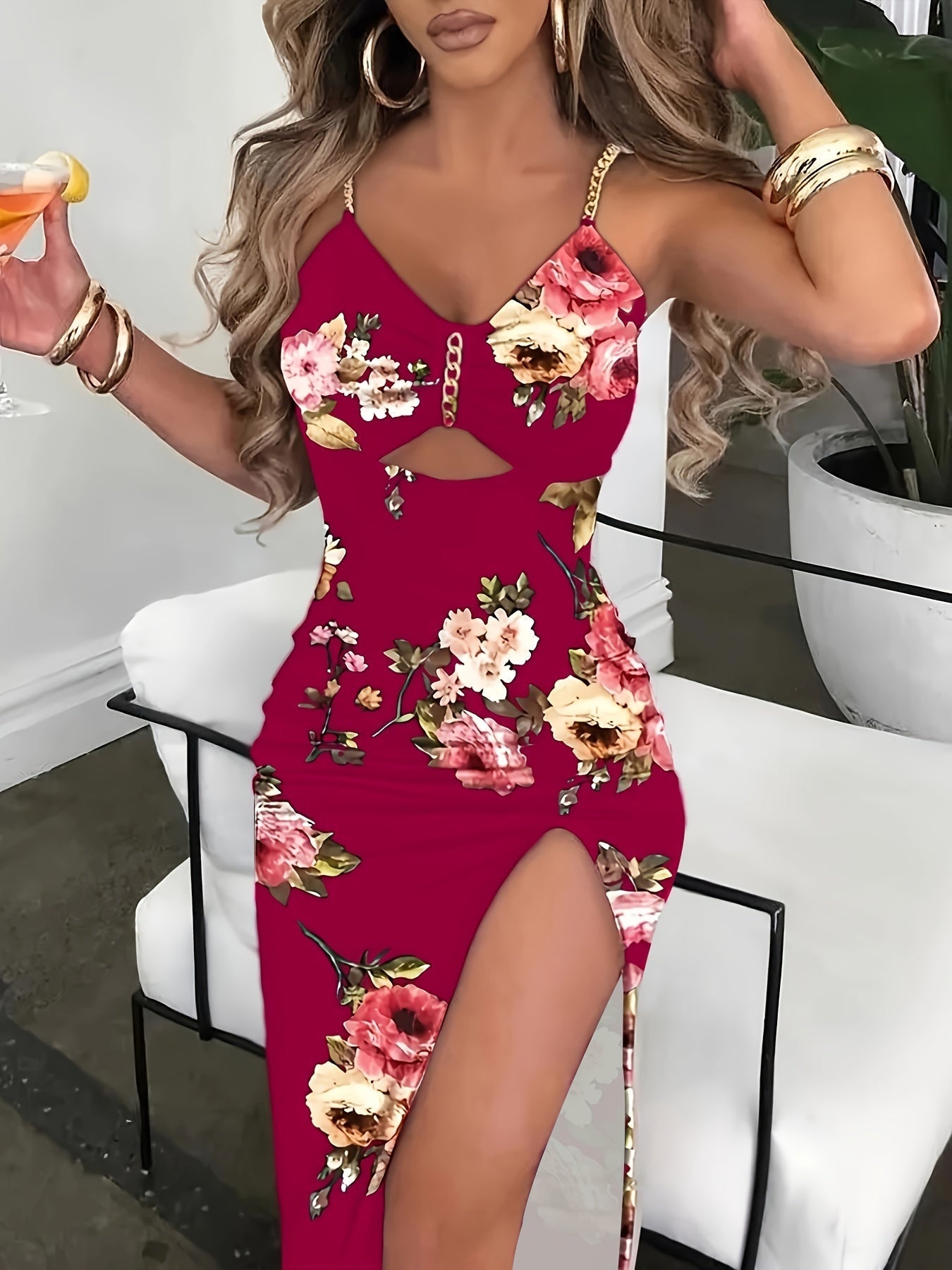Women's floral bodycon dress with cut-out detail and gold chain straps for a sleek party look