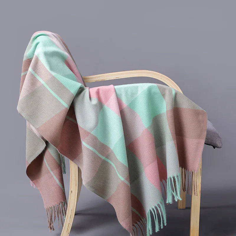 Women's oversized plaid wool shawl in classic tartan pattern, cozy winter wrap with generous coverage