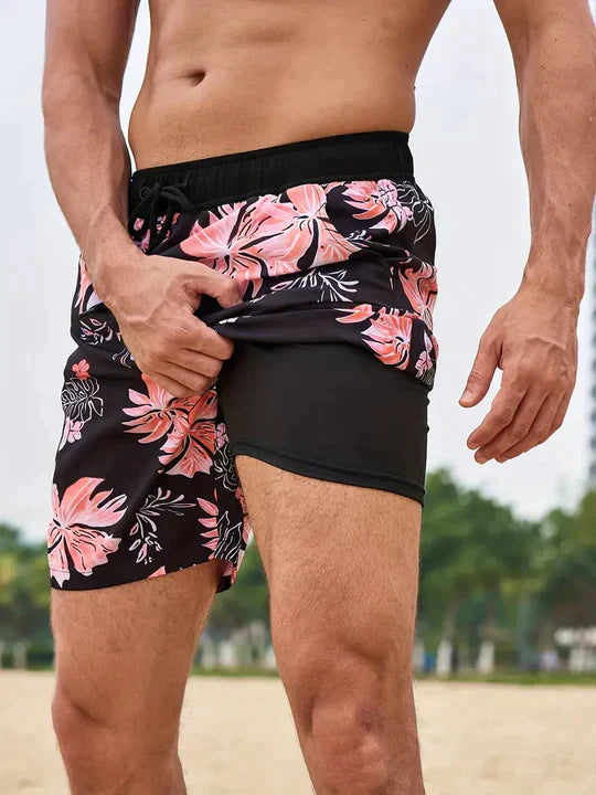 Men's tropical palm print beach shorts with adjustable drawstring waist for bold coastal summer style