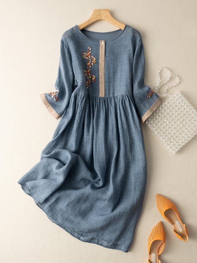 Women's relaxed fit cotton linen dress with embroidered detail, button closure, three-quarter sleeves